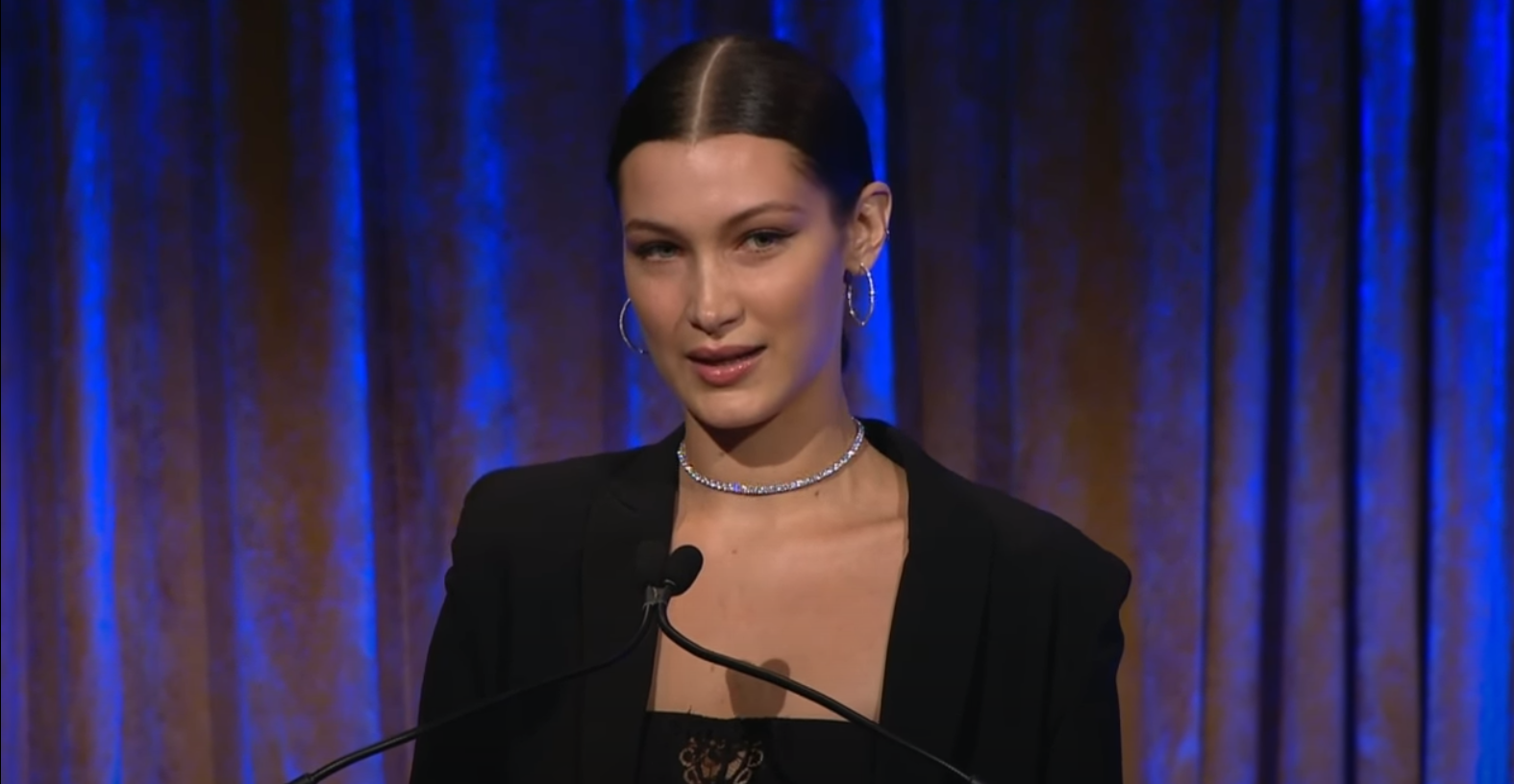 Bella Hadid giving a speech at the 2016 Global Lyme Alliance New York Gala.