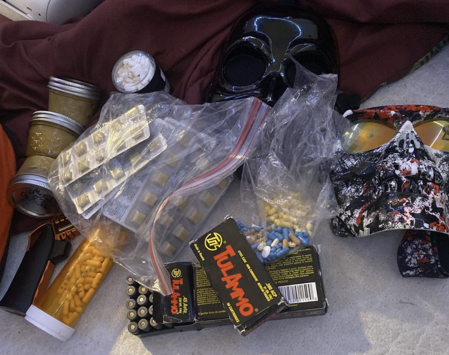 A mask, drugs, and ammunition.