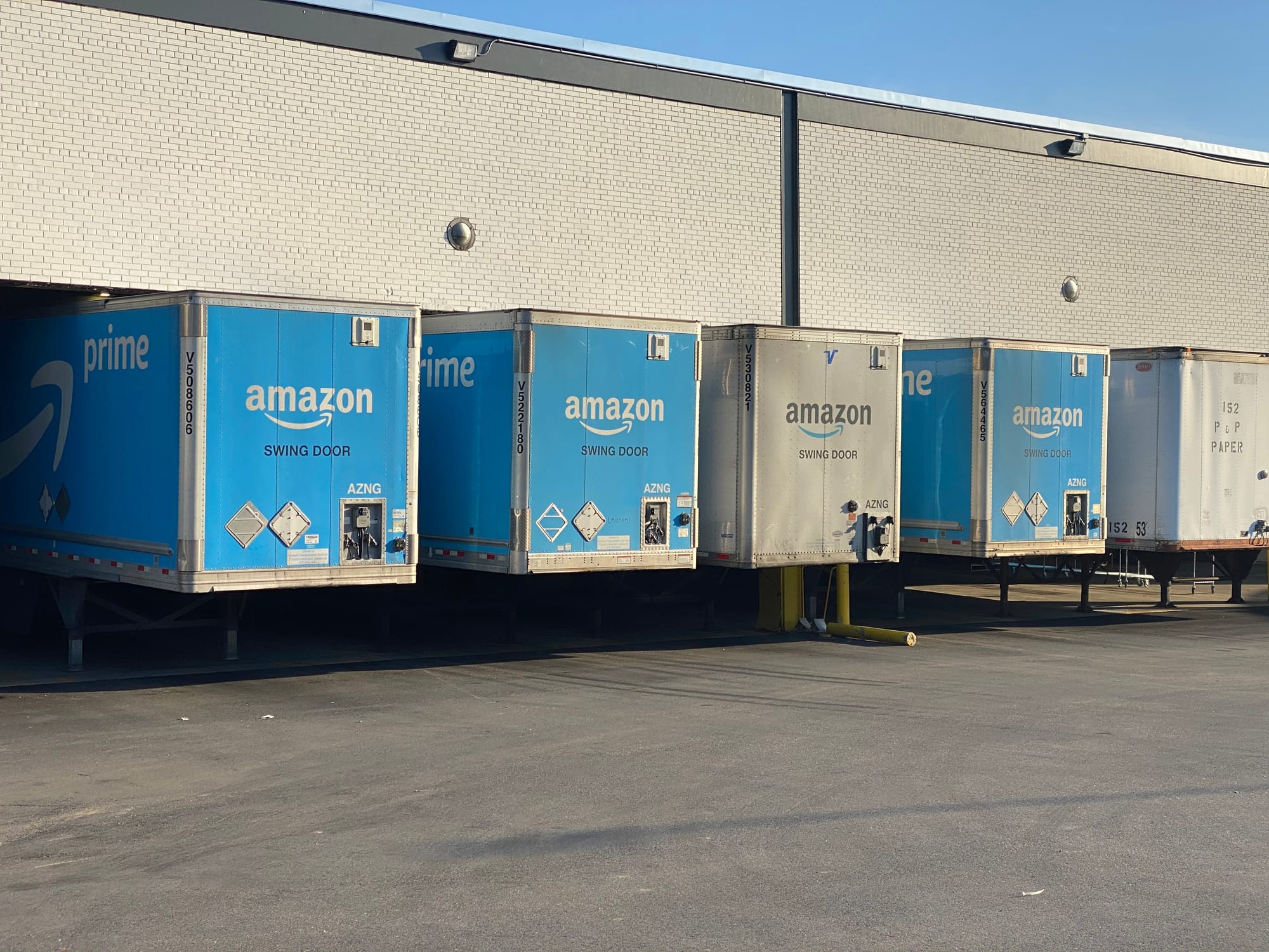 Parked Amazon trucks.