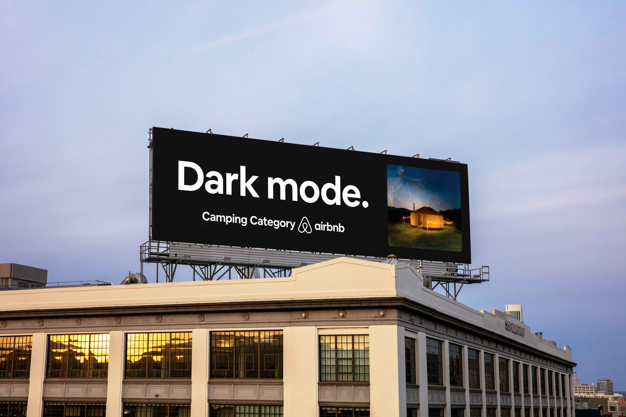 An Airbnb sign saying "Dark Mode. Camping Category Airbnb."