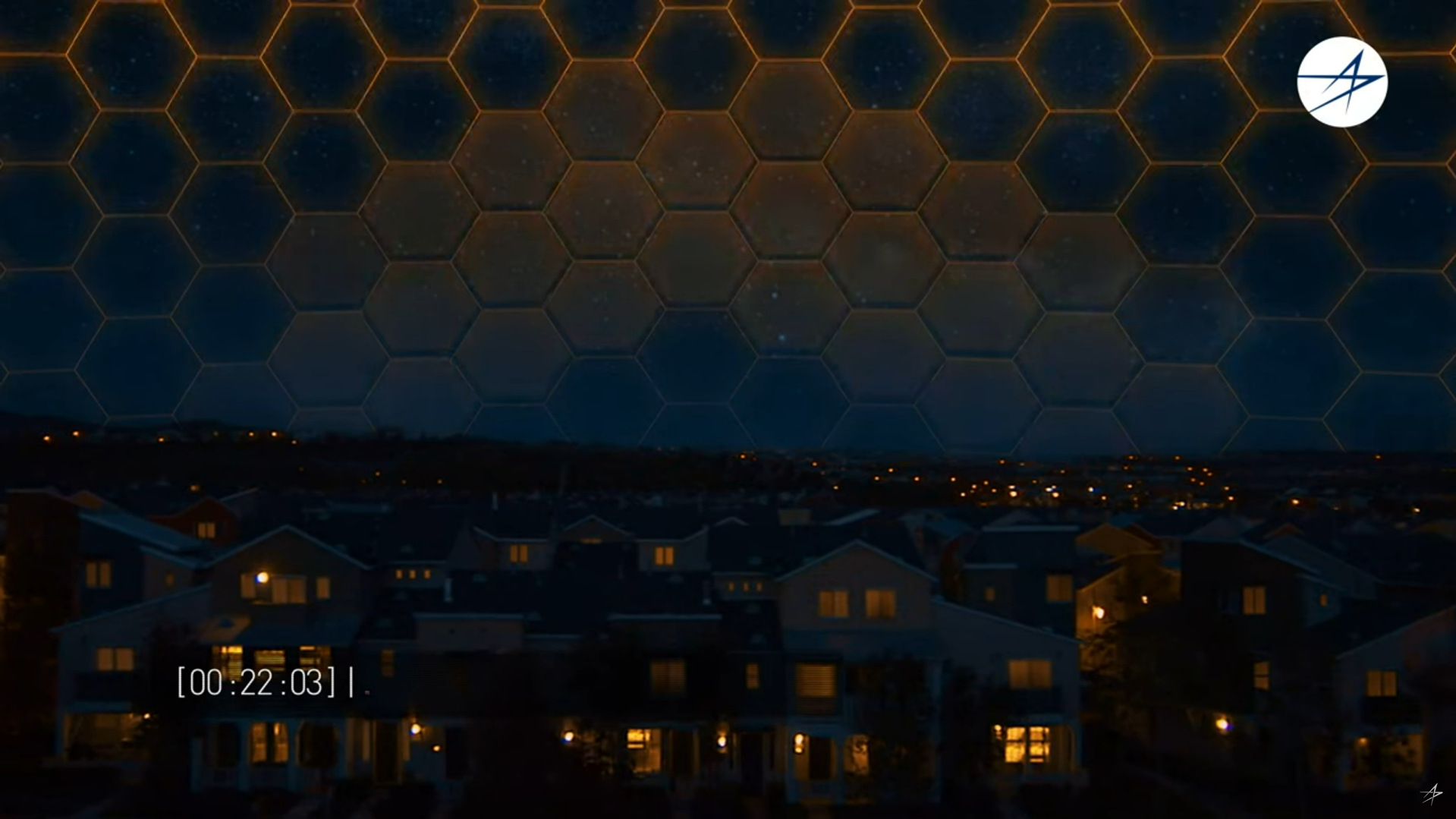 A golden cascade above a suburban night scene.