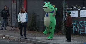The Surreal Practicality of Protesting As an Inflatable Frog